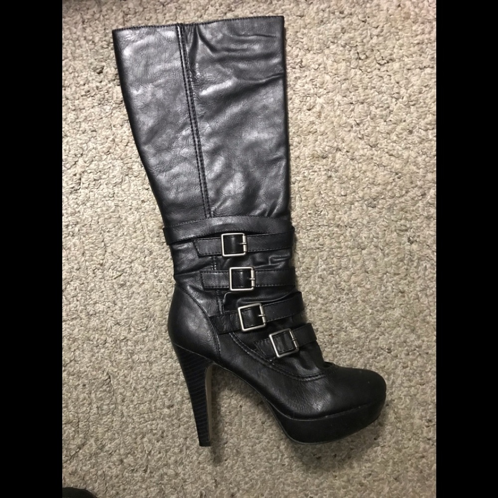 Black knee high leather boots worn once